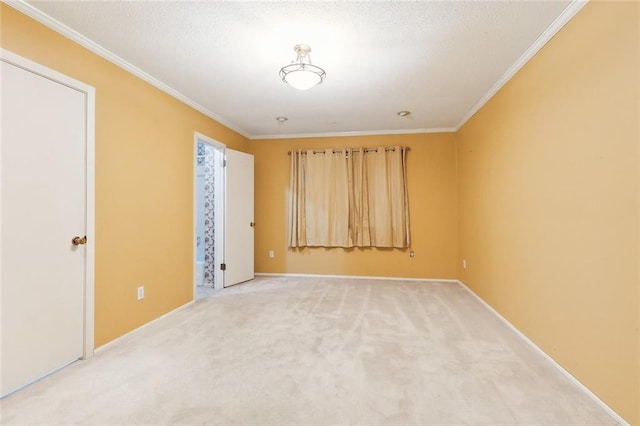 unfurnished room featuring carpet flooring and ornamental molding