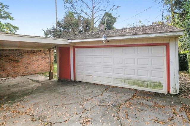 garage with a carport