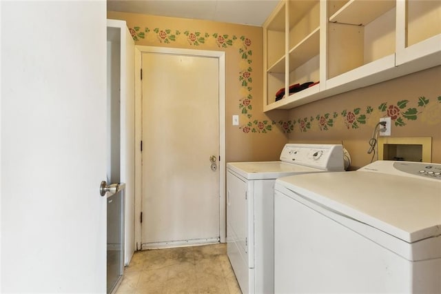 laundry room featuring washing machine and dryer