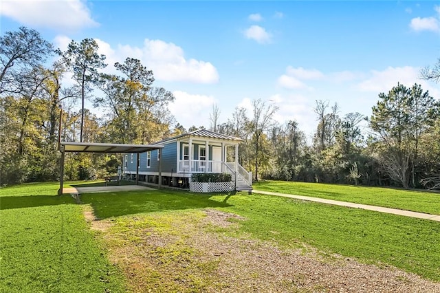 exterior space featuring a lawn, a porch, and a carport