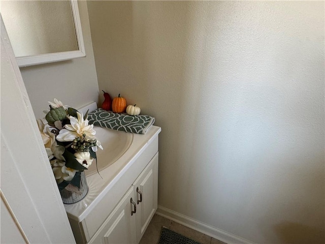 bathroom featuring tile patterned floors and vanity