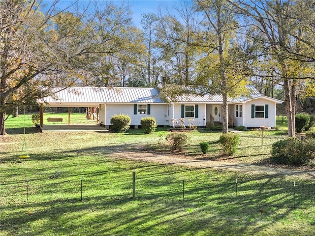 ranch-style house with a front yard and a carport