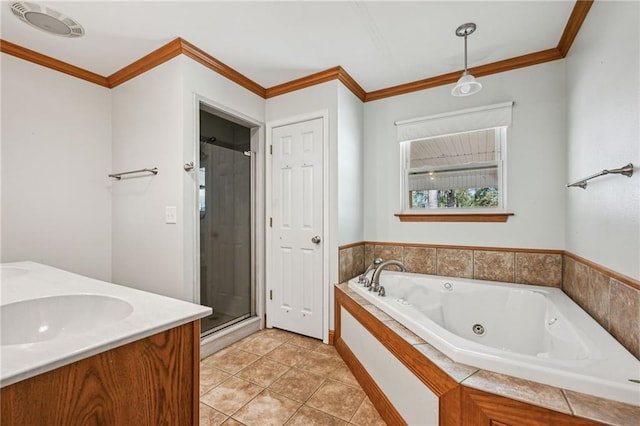 bathroom with tile patterned flooring, vanity, crown molding, and independent shower and bath