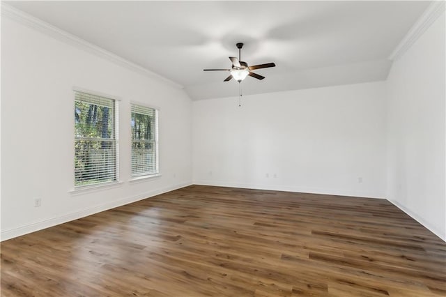 unfurnished room with ceiling fan, ornamental molding, and dark wood-type flooring