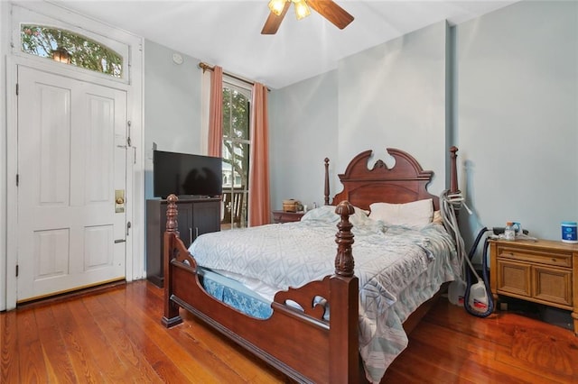 bedroom featuring hardwood / wood-style flooring and ceiling fan