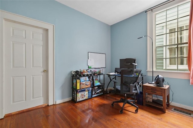 office area with wood-type flooring