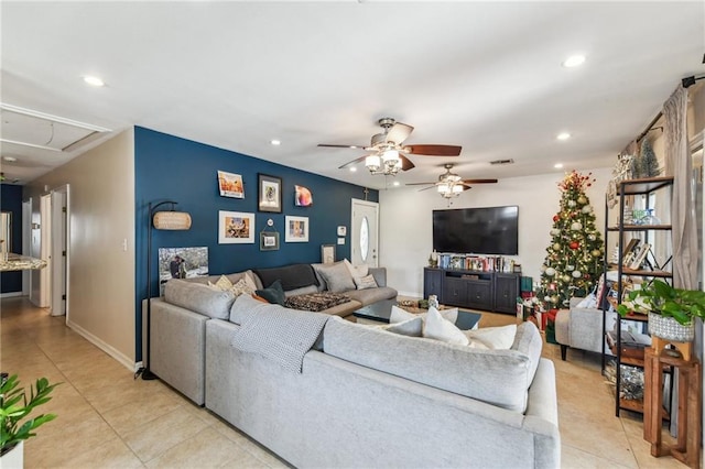 tiled living room featuring ceiling fan