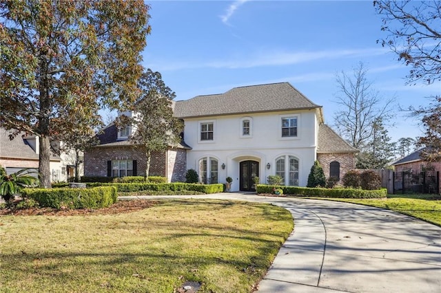 view of front of house with a front lawn