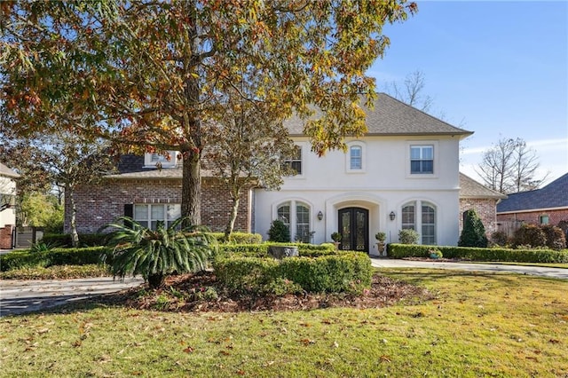 view of front of property with a front lawn