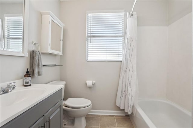 full bathroom with tile patterned flooring, vanity, shower / bath combo, and toilet