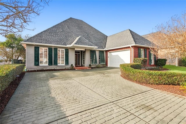 view of front of property featuring a garage