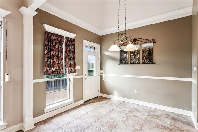 unfurnished dining area featuring tile patterned flooring, decorative columns, ornamental molding, and a notable chandelier