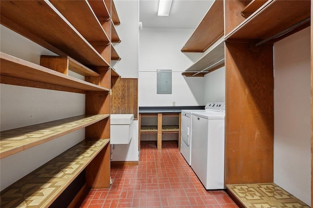 laundry area featuring independent washer and dryer and electric panel