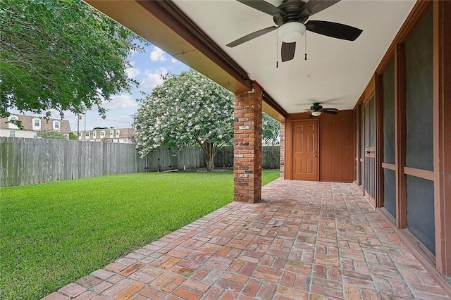 view of patio / terrace featuring ceiling fan