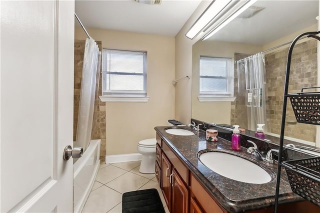 full bathroom with tile patterned floors, vanity, toilet, and shower / tub combo with curtain