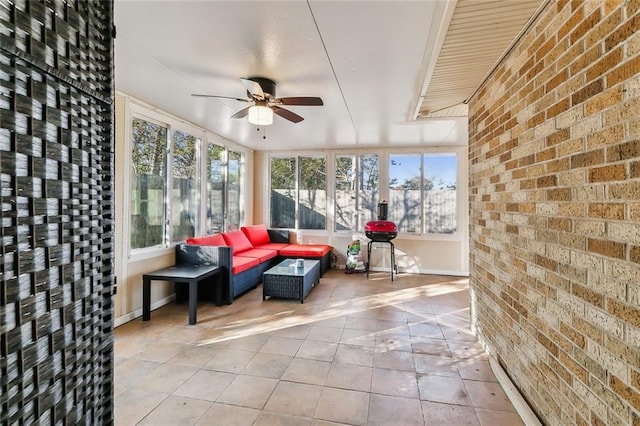 sunroom / solarium with ceiling fan