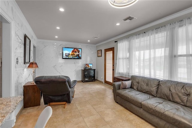 living room with tile walls and ornamental molding