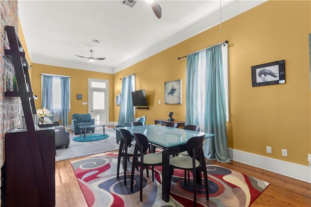 dining room featuring hardwood / wood-style flooring and ceiling fan