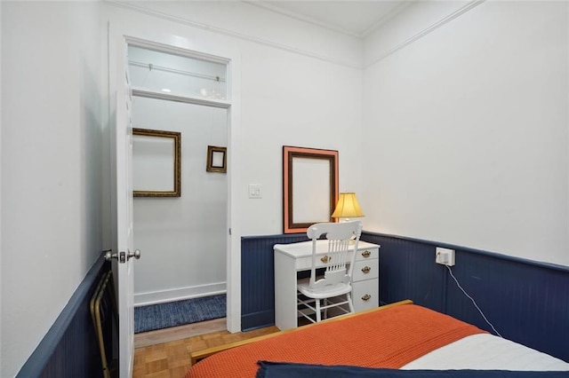 bedroom with parquet flooring