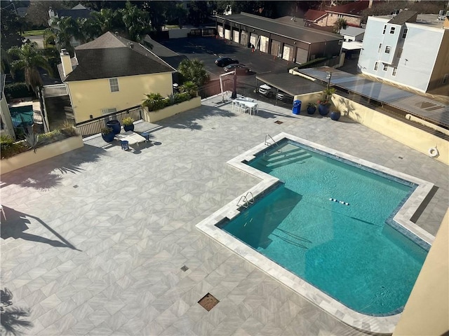 view of swimming pool with a patio