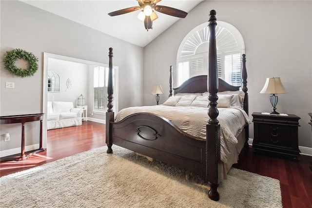 bedroom with ceiling fan, dark hardwood / wood-style floors, and vaulted ceiling