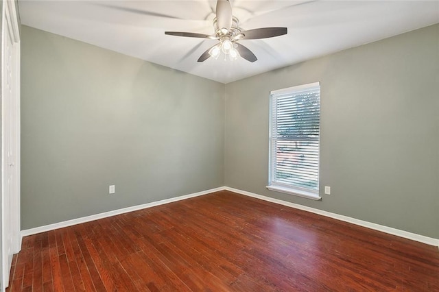 spare room with ceiling fan and hardwood / wood-style floors