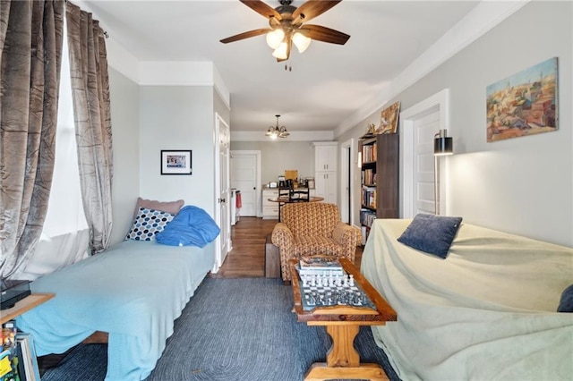 living room featuring ceiling fan and dark wood-type flooring