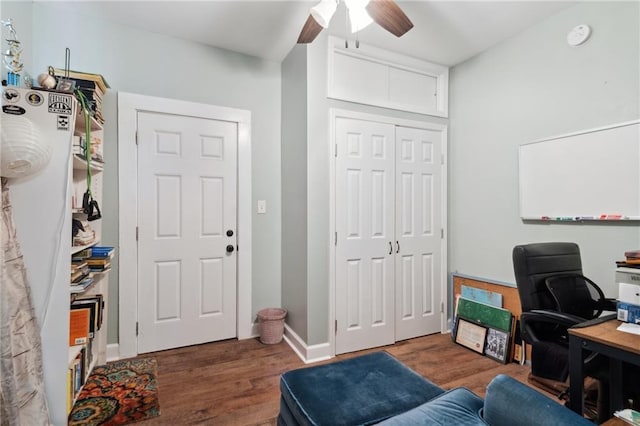 office featuring dark hardwood / wood-style flooring and ceiling fan