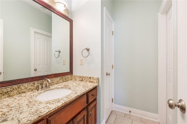 bathroom featuring tile patterned floors and vanity