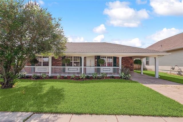 single story home featuring a porch, a front yard, and a carport