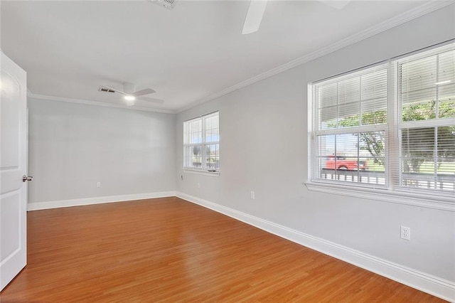 2525 Paul St, Meraux, LA 70075 - unfurnished room featuring ceiling fan, wood-type flooring, and crown molding