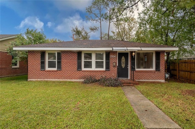 view of front facade with a front yard