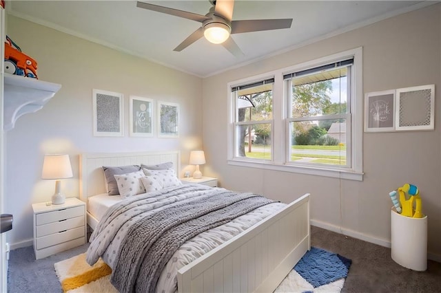 bedroom with carpet floors, ceiling fan, and ornamental molding