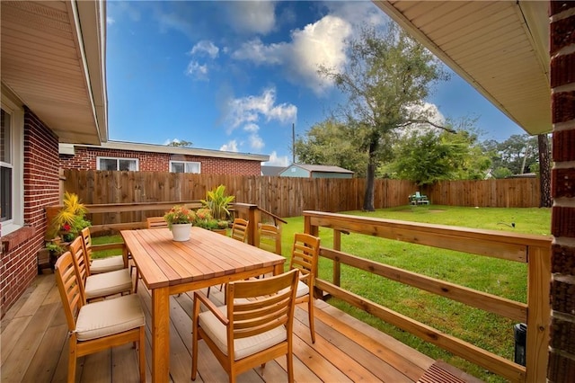 deck featuring a lawn