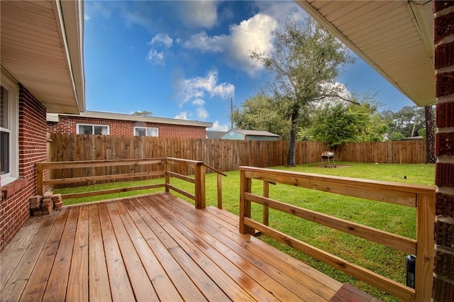 deck featuring a lawn