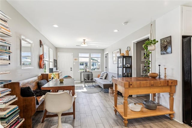 interior space featuring ceiling fan