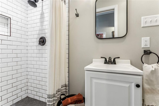 bathroom featuring vanity and a shower with shower curtain