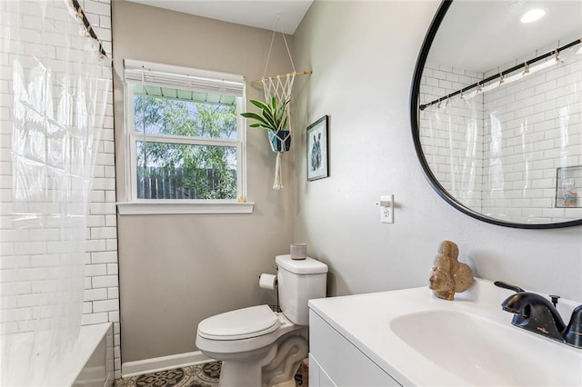 full bathroom with vanity, toilet, and shower / bath combo with shower curtain