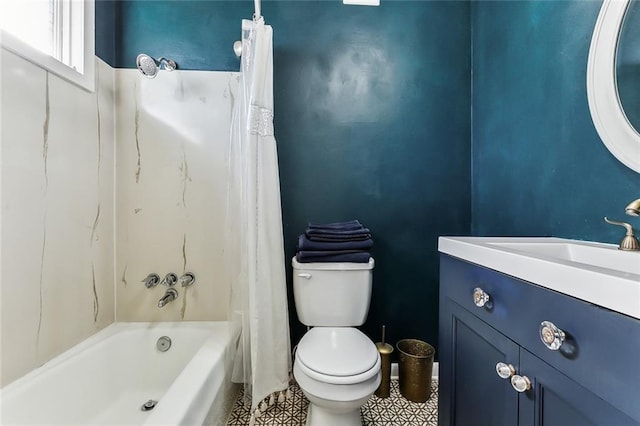 full bathroom with tile patterned flooring, shower / tub combo with curtain, vanity, and toilet