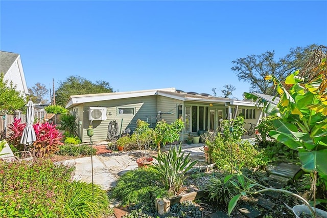 back of house with a patio