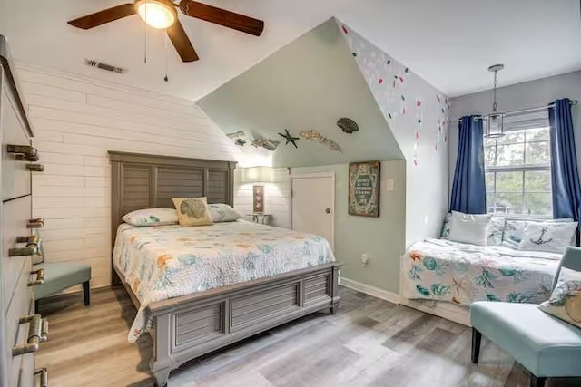 bedroom featuring light wood-type flooring and ceiling fan