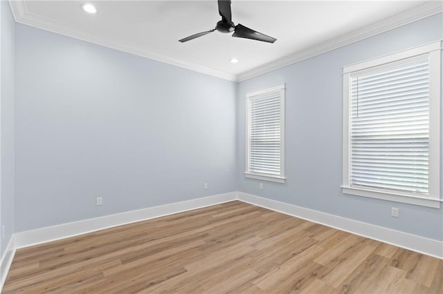 unfurnished room featuring ceiling fan, ornamental molding, and light hardwood / wood-style flooring