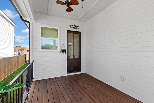 doorway to property featuring ceiling fan