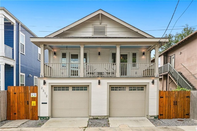 view of front of house with a garage and covered porch