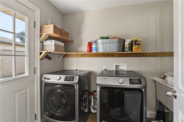 laundry area with washing machine and dryer