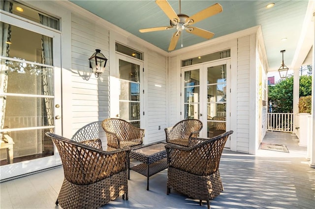 view of patio featuring french doors and ceiling fan