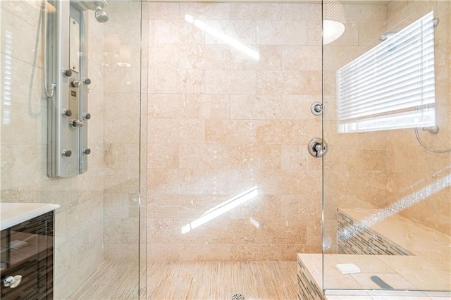 bathroom with tiled shower