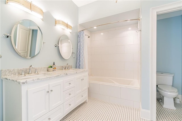 full bathroom with shower / bath combo, toilet, and vanity