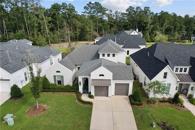 birds eye view of property with a residential view