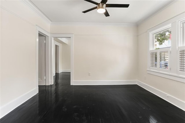 spare room with ornamental molding, ceiling fan, and dark hardwood / wood-style flooring